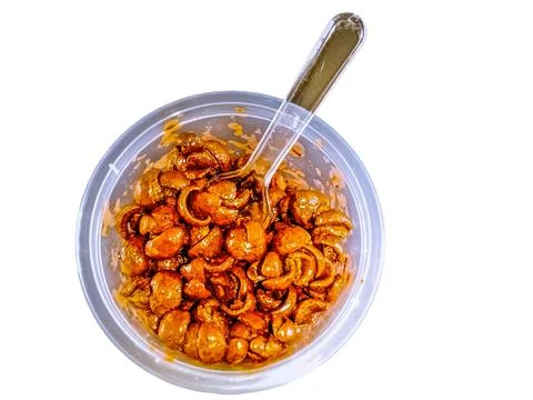 Choco jar snacks covered in chocolate in a small transparent container Stock Photos
