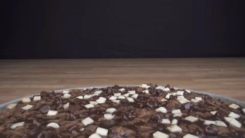Chocolade pizza on table closeup dolly out Stock Footage 124017105