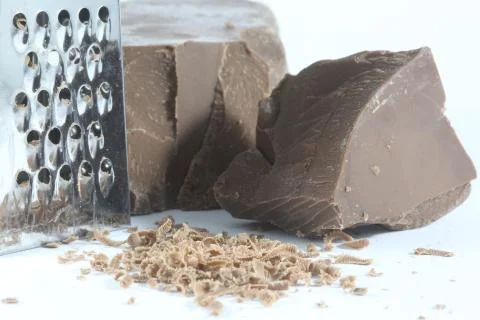 Chocolate and grater Stock Photos