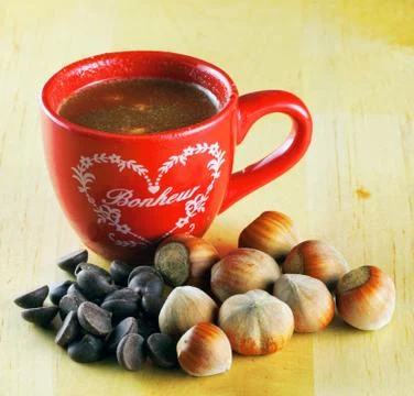 Chocolate and hazelnuts Stock Photos
