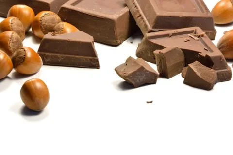 Chocolate and hazelnuts Stock Photos
