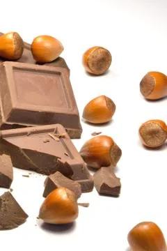 Chocolate and hazelnuts Stock Photos