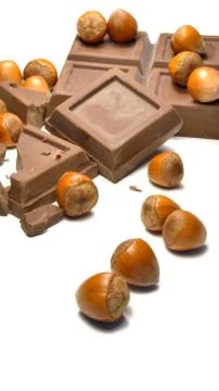 Chocolate and hazelnuts Stock Photos