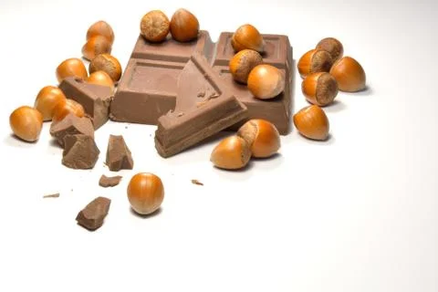 Chocolate and hazelnuts Stock Photos