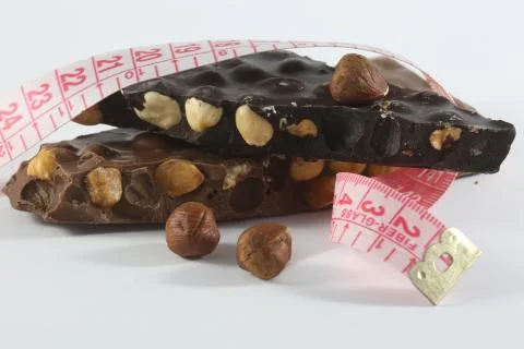 Chocolate and hazelnuts 库存照片