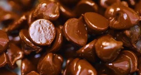 Chocolate and nuts close up Stock Photos