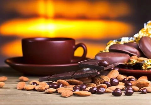 Chocolate and nuts Stock Photos