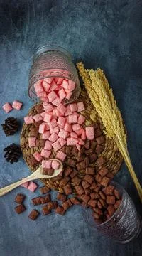 Chocolate and strawberry flavored cereal Stock Photos