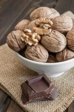 Chocolate and walnuts Stock Photos