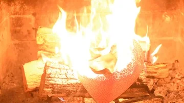 Chocolate assortment box on fire part 3 Stock Footage 86146142