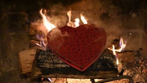 Chocolate assortment box on fire very fast Stock Footage 86146201