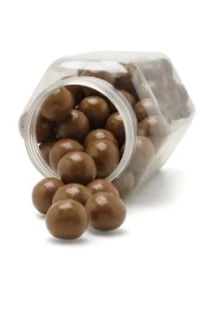 Chocolate balls from fallen container Stock Photos