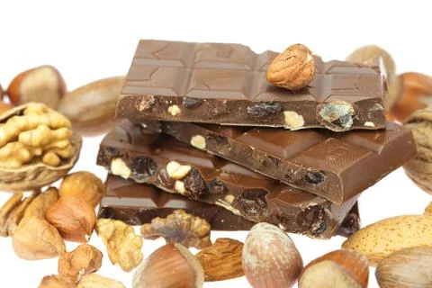 Chocolate bar and nuts  isolated on white Foto stock