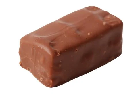 A chocolate bar with a brown wrapper Stock Photos