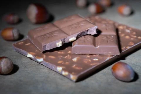 Chocolate bar with hazelnuts Stock Photos