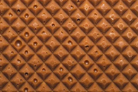 Chocolate bar macro texture. squared pattern background Stock Photos