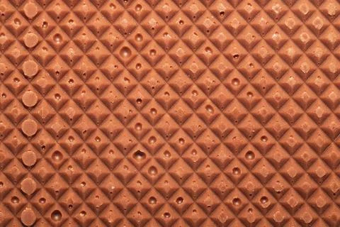 Chocolate bar macro texture. squared pattern background Stock Photos