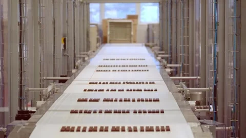 Chocolate bar production line with icing and liquid filling Stock Footage 323354806