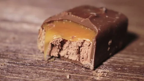 Chocolate Bar On A Table Squashed Stock Footage 70565869