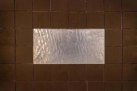 Chocolate bars on foil, lined with a rectangular frame. Stock Photos