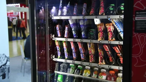 Chocolate bars in snack vending machine Stock Footage 237464299