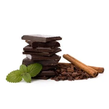 Chocolate bars stack and cinnamon sticks Stock Photos