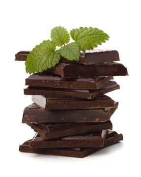 Chocolate bars stack and mint leaf Foto stock