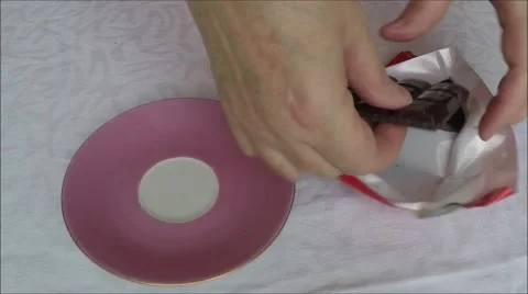 Chocolate bars stack on plate Stock Footage 45876190