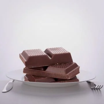Chocolate bars stack on plate. 写真素材