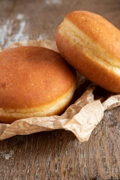 Chocolate beignets on rustic background Stock Photos