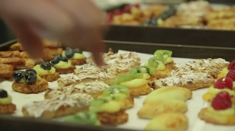 Chocolate biscuits and fruit pastries at a business networking event Stock Footage 64566086