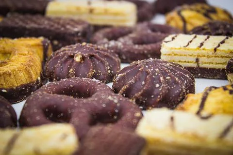 Chocolate biscuits and waffles on light background Stock Photos