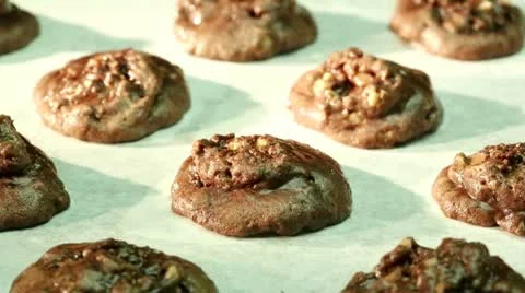 Chocolate biscuits baking in the oven (time lapse) Video stock 24673296
