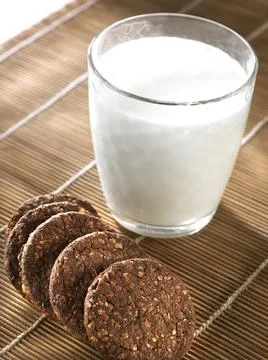 Chocolate Biscuits with cereals and milk Stock Photos