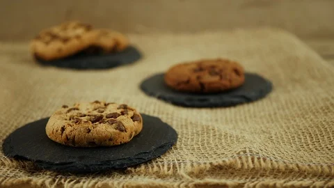 Chocolate biscuits on rustic background. Focus transition Video stock 92815237