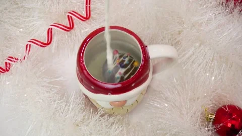 Chocolate bomb with marshmallows inside that melts from hot milk. Stock Footage 295116379