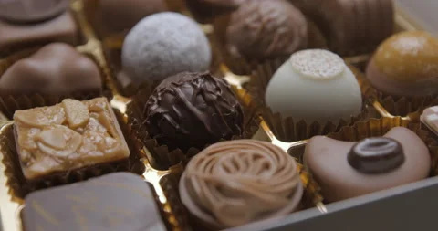 Chocolate box close up studio, bulimia, gluttony 스톡 동영상 242123779
