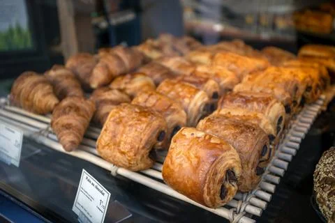 Chocolate bread stall in a bakery window Stock Photos