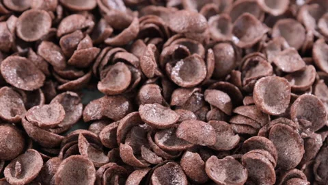 Chocolate breakfast cereal, thin crunchy cereal. View from above. Video stock 204748919