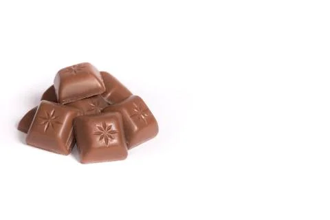 Chocolate bricks on the white background Stock Photos