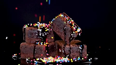 Chocolate Brownie Stack Topped With Rainbow Sprinkles Stock Footage 316746880