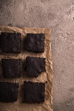 Chocolate brownies on brown background Stock Photos