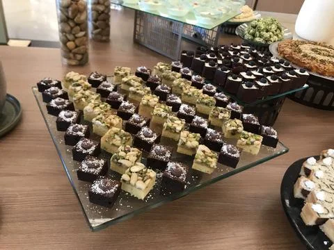 The chocolate cake and sweets on the table Stock Photos