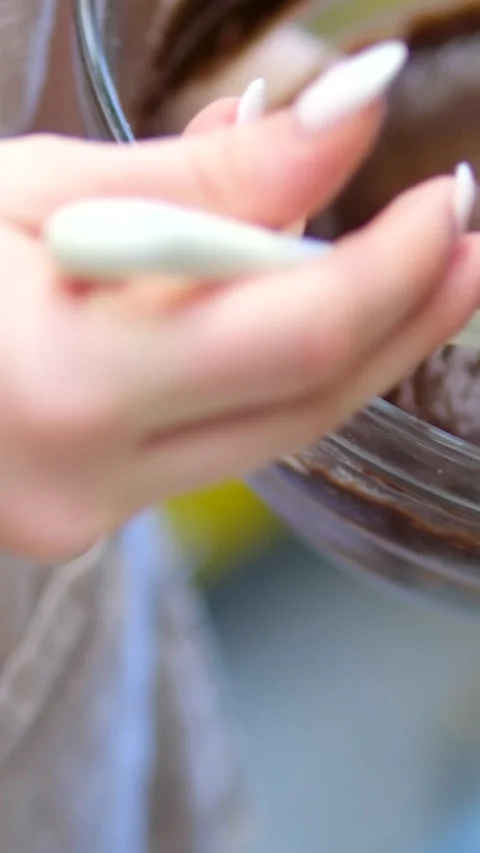 Chocolate cake batter Pour Batter Into A Baking Dish. Stock Footage 306932658