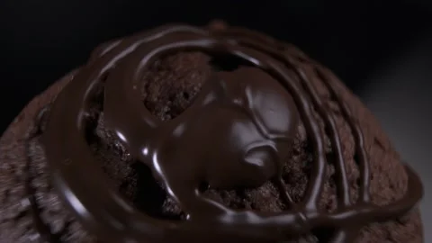 Chocolate cake brownie rotating in front of camera on black background 스톡 동영상 167524662