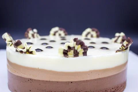Chocolate cake. Cake of several varieties of chocolate: black, milk and white Stock Photos