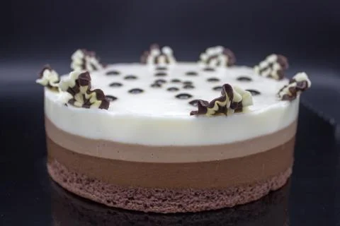 Chocolate cake. Cake of several varieties of chocolate: black, milk and white Stock Photos