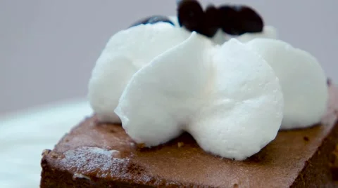 Chocolate cake with cream closeup Stock Footage 54228111