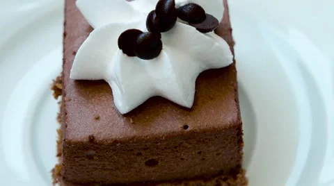 Chocolate cake with cream, top view Stock Footage 54227882