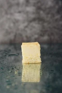 Chocolate cake cut on a mirror surface Foto stock